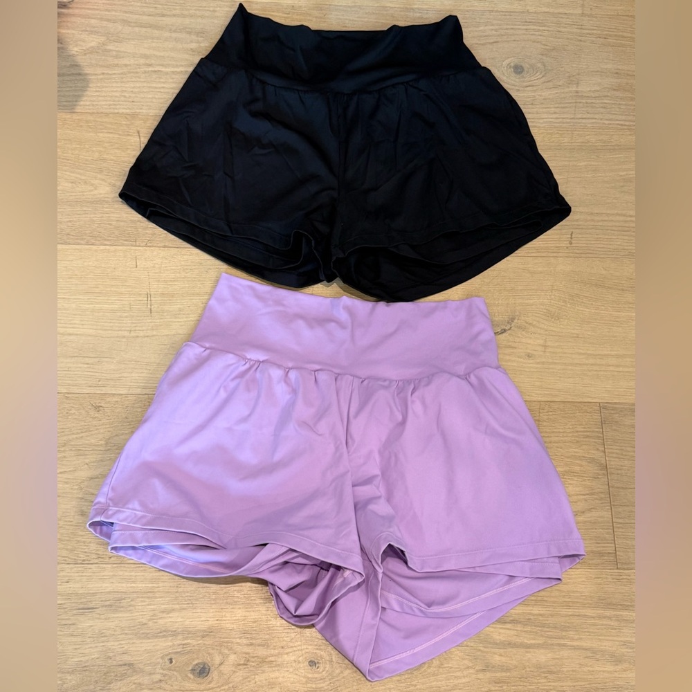 Two pair Halara shorts with hidden pockets, NWOT never worn